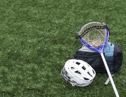 lacrosse equipment on the ground