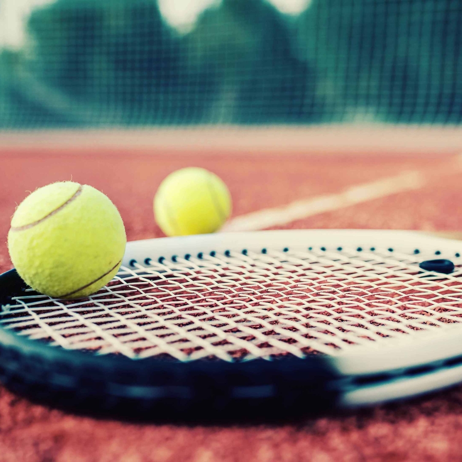 tennis equipment sitting on a court